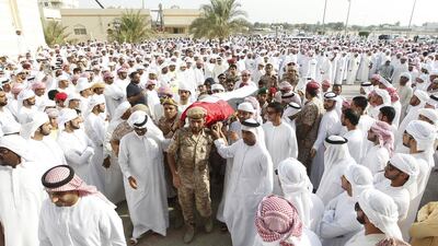 The bodies of 12 of the UAE’s fallen heroes were taken inside the mosque for prayers. Huge crowds came to pay their last respects to these heroes. Jeffrey E Biteng / The National