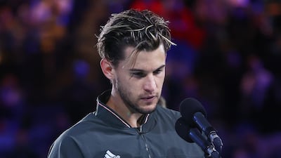 A despondent Dominic Thiem with the runner-up plate. Getty