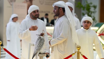 A falcon on display before the auction