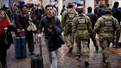 Members of the National Guard move through Union Station. Getty Images / AFP