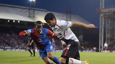 Luis Suarez, right, scored one of Liverpool's goals against Crystal Palace on Monday night. Dylan Martinez / Reuters