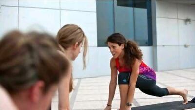 Noura El Imam teaches outdoor yogalates -a mix of yoga and pilates- during the summer months at Frasier Suites in Media City.