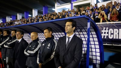 Real Madrid's interim coach Santiago Solari, right, waits for the start of the match. AP Photo