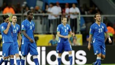 Italy players Alessandro Diamanti, right, Giorgio Chiellini, Mario Balotelli, Leonardo Bonucci and Alberto Aquilani have not had a lot to smile about after they surrendered eight goals during three matches in Brazil. Antonio Calanni / AP Photo