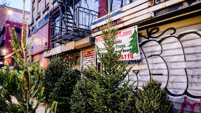 Christmas trees for sale on a sidewalk in New York, U.S. New York City had its credit rating cut by Fitch Ratings because of the impact the coronavirus pandemic is having on the city's economy. Bloomberg