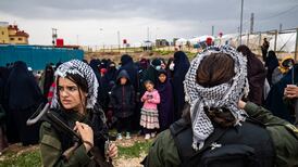 Women fighters stand guard during a joint operation by Syria's Kurdish Internal Security Police Force and the Syrian Democratic Forces, at Camp Roj, Hasakah province. AFP