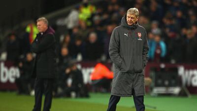 Arsene Wenger looks on from the touchline during Arsenal's goalless draw against West Ham United on Wednesday. Charlie Crowhurst / Getty Images