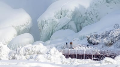 A partially frozen boardwalk tourist attraction near the American Falls is seen from Niagara Falls, Ontario, Canada. Reuters
