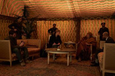 A film still from 'A Private War'. Marie Colvin dressed more stylishly when meeting leaders like Muammar Qaddafi.