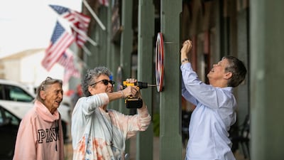 Relatives of Jimmy Carter put up painted peace symbols in Plains, Georgia, where the former US president is receiving end-of-life care at home. Reuters