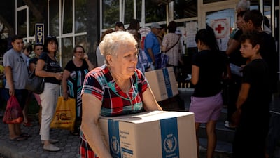 Humanitarian aid is provided for the needy at a distribution centre in Mykolaiv, Ukraine. AP