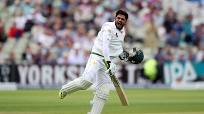 Pakistan batsman Azhar Ali celebrates his 100 not out during day two of the 3rd Test Match against England at Edgbaston cricket ground in Birmingham, England, Thursday, Aug. 4, 2016. (Nick Potts/PA via AP)