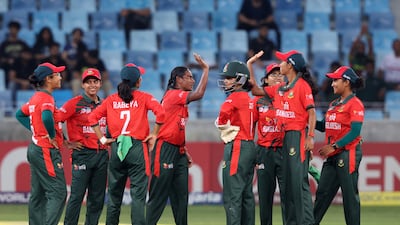 Bangladesh's Marufa Akter takes the wicket of UAE's Samaira Dharnidharka. Bangladesh won the match by 34 runs after restricting UAE to 69-9.