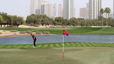 Henrik Stenson putts on the 5th. Chris Whiteoak / The National