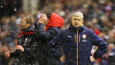 Arsene Wenger Manager of Arsenal reacts after Liverpool's third goal during the Barclays Premier League match between Liverpool and Arsenal at Anfield on January 13, 2016 in Liverpool, England. (Photo by Alex Livesey/Getty Images)