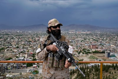 A Taliban special forces fighter stands guard at a park in Kabul, Afghanistan. AP