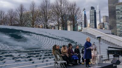 The large eye behind Ms Clinton, as well as other works of art, speaks to the current protests happening in Iran. AP