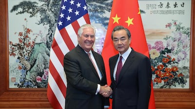 US secretary of state Rex Tillerson (L) shakes hands with Chinese foreign minister Wang Yi (R) before their meeting at the Great Hall of the People on September 30, 2017 in Beijing, China. Lintao Zhang / Reuters
