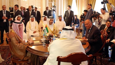 Sheikh Abdullah bin Zayed, Minister for Foreign Affairs and International Cooperation, with Saudi foreign minister Adel Al Jubeir, left, the Egyptian foreign minister Sameh Shoukry, right, and the Bahraini foreign minister Khalid bin Ahmed Al Khalifa at a meeting in Cairo on July 5, 2017, after Qatar issued its response to a list of demands from their countries. Khaled Elfiqi via AP