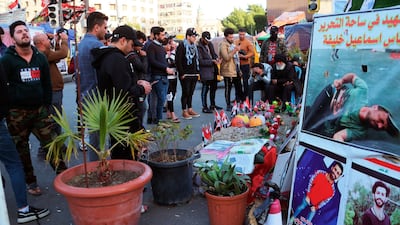 Posters of anti-government protesters who have been killed in demonstrations are displayed in Tahrir Square during ongoing protests in Baghdad, Iraq. AP Photo