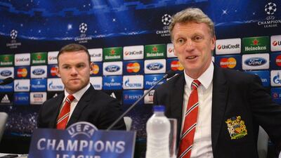 Wayne Rooney, left, and manager David Moyes speak to the media during the Manchester United press conference at Karaiskakis Stadium on February 24, 2014 in Piraeus, Greece. Michael Regan/Getty Images
