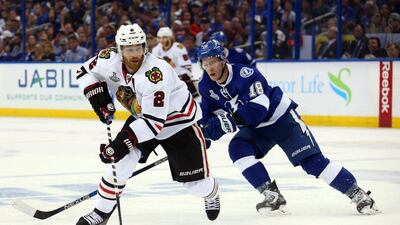 Duncan Keith of the Chicago Blackhawks skates with the puck against the Tampa Bay Lightning in Game 1 of the Stanley Cup Final on Wednesday. Bruce Bennett / Getty Images / AFP / June 3, 2015