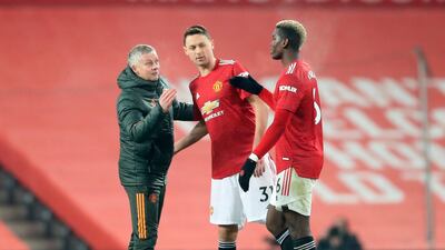 Manchester United's Paul Pogba (R), Nemanja Matic (C) and manager Ole Gunnar Solskjaer (L) celebrate the win. EPA