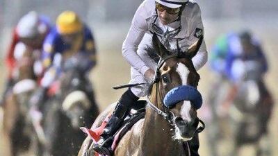 Aaron Gryder riding Well Armed won the Dubai World Cup in 2009. Kamran Jebreili / AP Photo