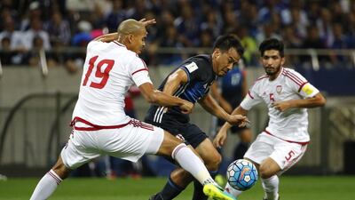 Ismail Ahmed, left, in action during the UAE's 2-1 victory over Japan in September. Shuji Kajiyama / AP Photo