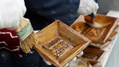 Palestinian women work at a carpenter workshop, established and run by a group of women, in the village of Al Walajeh near the West bank town of Bethlehem. AFP