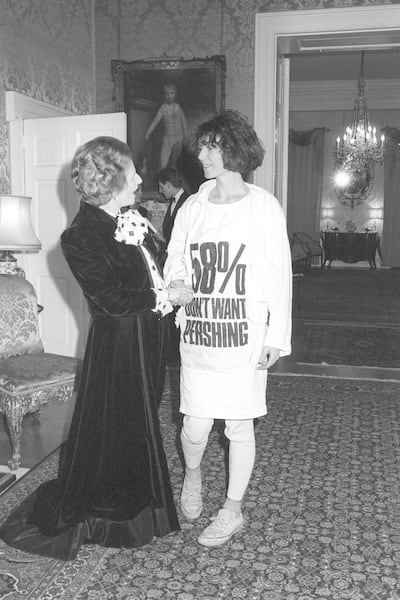 Designer Katharine Hamnett takes her message to Margaret Thatcher at 10 Downing Street.