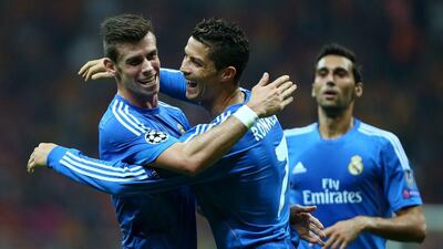 Cristiano Ronaldo, centre, scored a hat-trick against Galatasaray on Tuesday night. Burak Kara / Getty Images