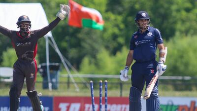 UAE's Vriitya Aravind celebrates after Kyle Coetzer is bowled by Kashif Daud.