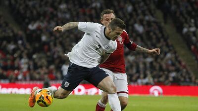 Jack Wilshere suffered a hairline fracture in his foot on Wednesday against Denmark in England's international friendly at Wembley Stadium. Sang Tan / AP / March 5, 2014