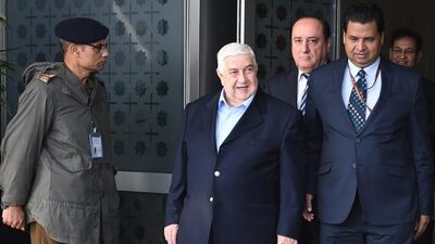 Syrian deputy prime minister and foreign minister, Walid Al Moualem, centre, arriving at the Indira Gandhi International Airport in New Delhi on January 11, 2016. Mr Moualem is on an official visit to India and will meet prime minister Narendra Modi. Money Sharma / AFP Photo