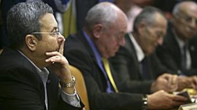 Ehud Barak, left, will remain as Israel's Defence Minister if the pact with the Prime Minister-designate Benjamin Netanyahu is ratified.