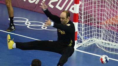 Spain's goalkeeper Jose Hombrados Ibanez fails to make a save during the men's preliminaries Group A handball match against Denmark at the Copper Box hall. Javier Soriano / AFP