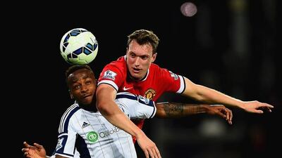 Phil Jones of Manchester United challenges Saido Berahino of West Bromwich Albion during their 2-2 Premier League draw on Tuesday in Birmingham. Laurence Griffiths / Getty Images