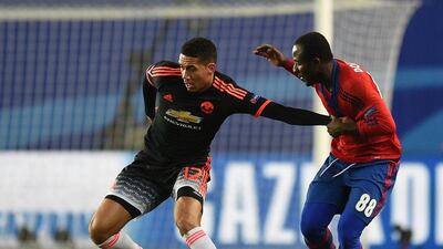 Manchester United's Chris Smalling, left, in action during their Uefa Champions League Group B match against CSKA Moscow at the Arena Khimki Stadium on October 21, 2015 in Moscow, Russia. (Photo by Epsilon/Getty Images)