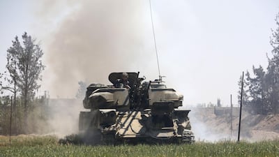 Pro-Syrian regime forces are seen as they advance towards the town of Douma, the last opposition holdout in Eastern Ghouta, on April 7, 2018, after regime troops resumed a military blitz to pressure rebels to withdraw. AFP