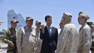 Photo released by the Syrian presidency shows Bashar Al Assad with the Russian army's Chief of Staff, Gen Valery Gerasimov, inspecting the Russian Hmeimim air base in the province of Latakia, Syria on June 27, 2017. Syrian Presidency via Facebook
