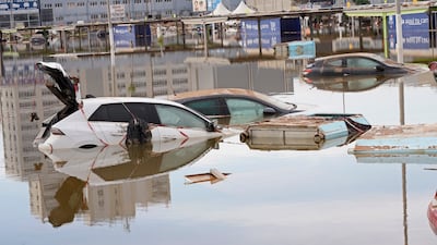 More than 48cm of rain fell on high ground in eight hours, causing flash floods in urban centres such as Valencia. AP