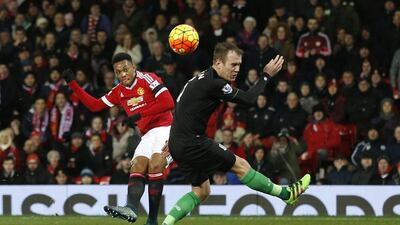 Anthony Martial of Manchester United scores their second goal against Stoke City on Tuesday night in the Premier League. Carl Recine / Action Images / Reuters