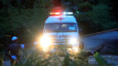 An ambulance leaves the Tham Luang cave complex in northern Thailand on July 9, 2018, as four more boys were brought out by rescuers. Soe Zeya Tun / Reuters