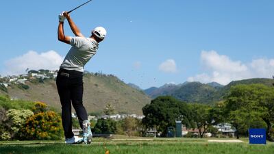 Collin Morikawa plays his shot from the seventh tee during the second round of the Sony Open in Hawaii. AFP