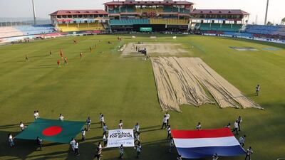 Schoolchildren carry national flags of Bangladesh and the Netherlands, as they prepare for the first match at the Himachal Pradesh Cricket Association (HPCA) stadium in Dharmsala, India, Tuesday, March 8, 2016. The venue, which hosts several ICC Twenty20 World Cup matches, will hold the first match between Bangladesh and the Netherlands on March 9. (AP Photo/Ashwini Bhatia)