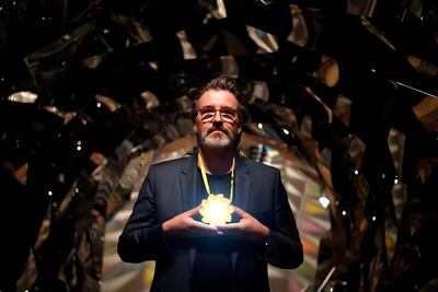 Danish-Icelandic artist Olafur Eliasson poses during a press preview at the Tate Modern in London. Photo: EPA