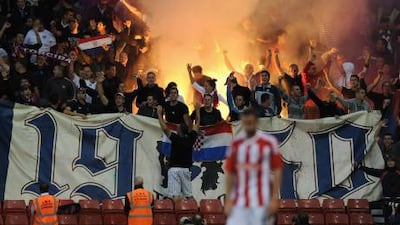 Hajduk Split supporters make their presence felt at Stoke City's Britannia Stadium in a Europa League game last year.