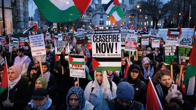 Pro-Palestinian protesters at London's Parliament Square as British MPs debated a motion in Parliament to call for a ceasefire in Gaza, on February 21. EPA