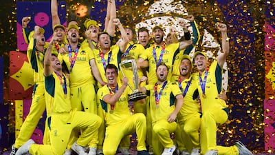 Australia celebrate with the Cricket World Cup trophy after their victory against India at Narendra Modi Stadium on November 19, 2023. Getty Images